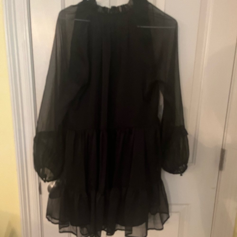 Lena. Black small flowy dress. New with tags.